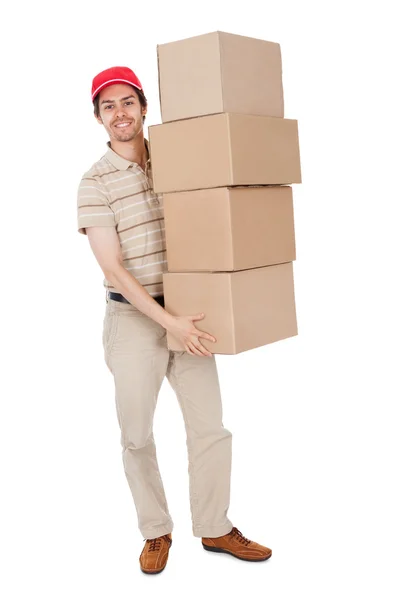 Entrega homem carregando pilha de caixas — Fotografia de Stock
