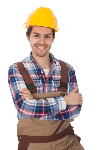 Kendine güvenen işçi giyiyor zor şapka — Stok fotoğraf