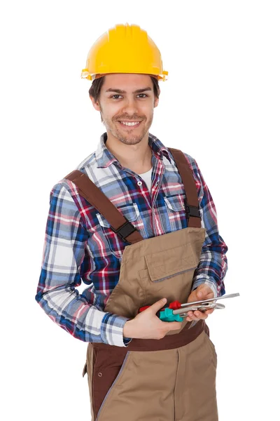 Kendine güvenen işçi giyiyor zor şapka — Stok fotoğraf