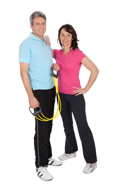 Active mature couple doing fitness — Stock Photo, Image