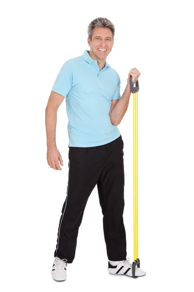 Active mature man doing exercises — Stock Photo, Image