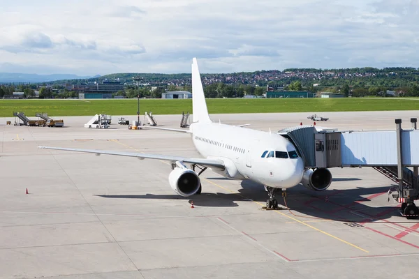 stock image An airplane at the airport on the tarmac