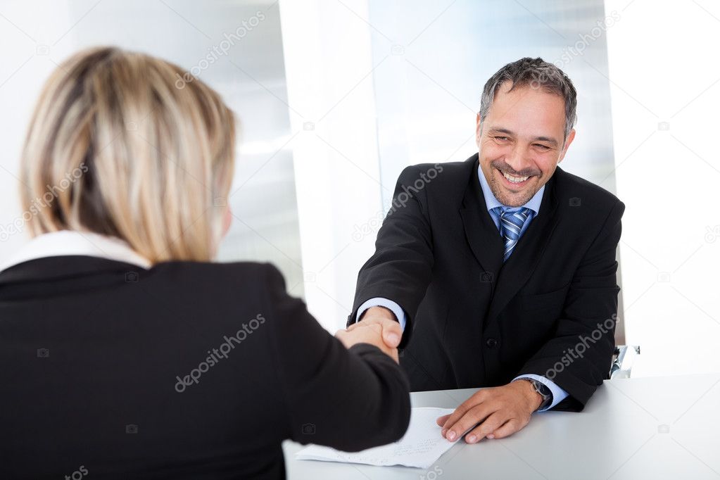 Businessman at the interview shaking hands