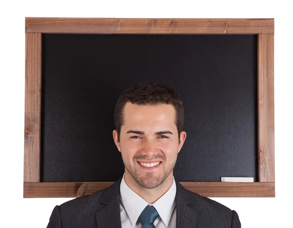 Biznesmen stojący z przodu na tablicy — Zdjęcie stockowe