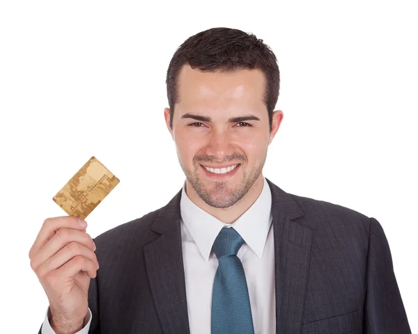 Başarılı bir iş adamı holding kredi kartı — Stok fotoğraf