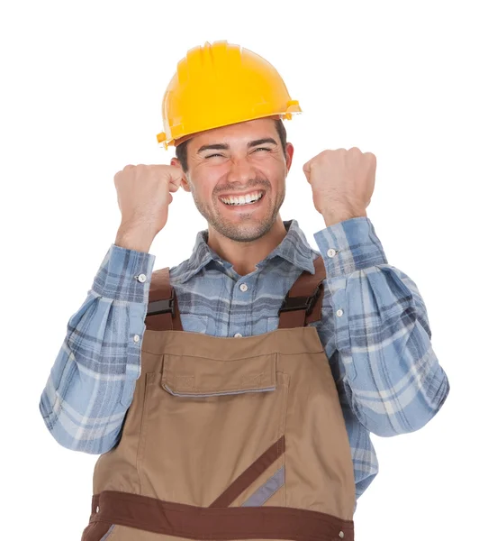 Travailleur excité portant un casque dur — Photo