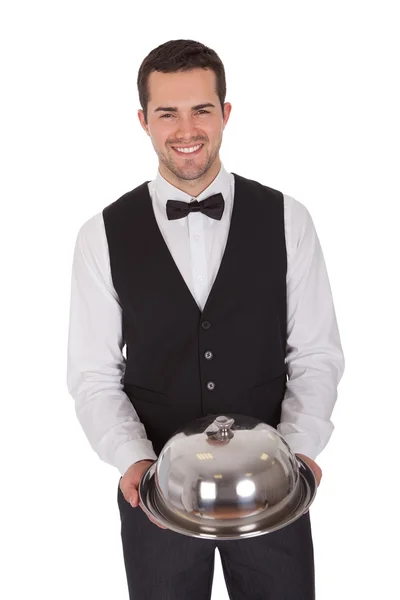 Portret van een vrolijke jonge butler — Stockfoto