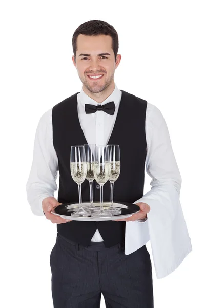 Portrait of a cheerful young butler — Stock Photo, Image
