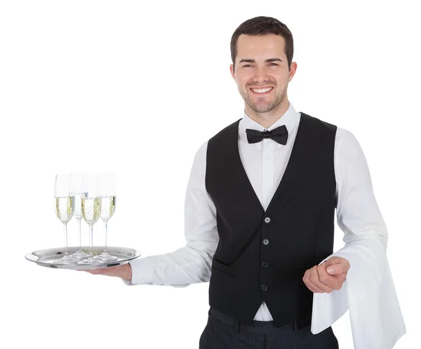 Portrait of a cheerful young butler — Stock Photo, Image