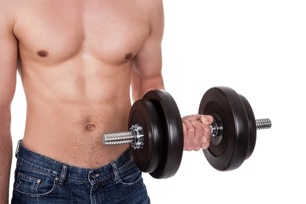 Young man exercising his biceps — Stock Photo, Image