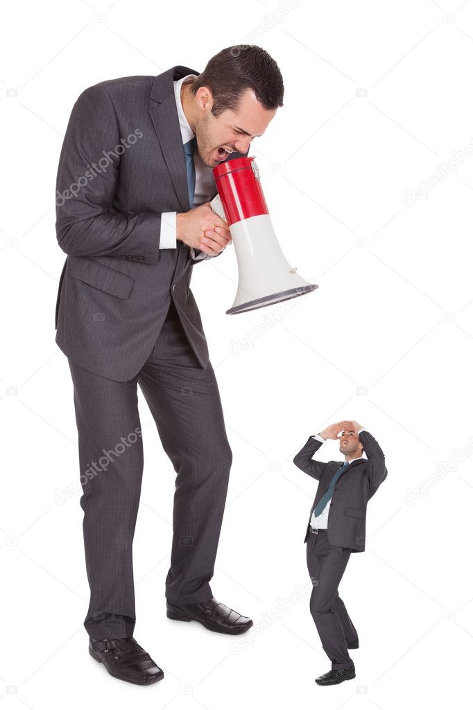 Boss screaming in megaphone at employee