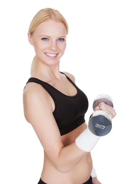 Mujer fitness haciendo entrenamiento con pesas —  Fotos de Stock