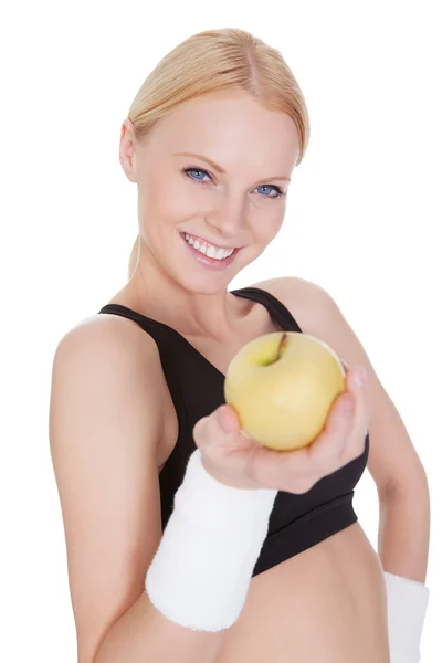 Piękne młode fitness kobieta z jabłkiem — Zdjęcie stockowe