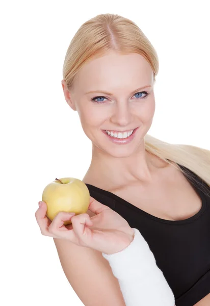 Vackra unga fitness kvinna med äpple — Stockfoto
