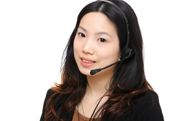 Young asian business woman with headset — Stock Photo, Image