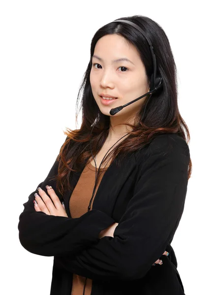 Giovane donna d'affari asiatica con auricolare — Foto Stock