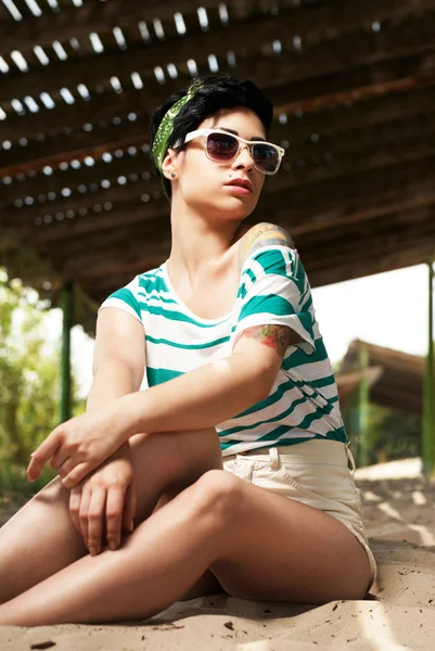 Adorable girl with tattoo wearing sunglasses — Stock Photo, Image