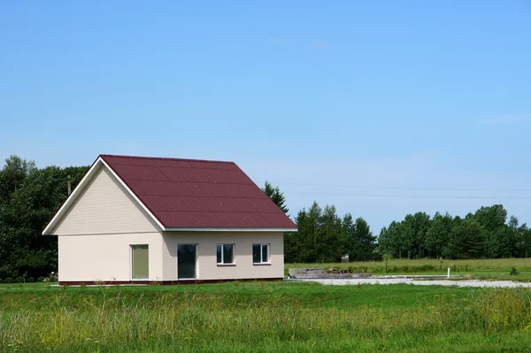 Dům a pole — Stock fotografie
