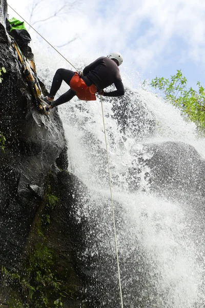 Waterfall Rappelling — стокове фото