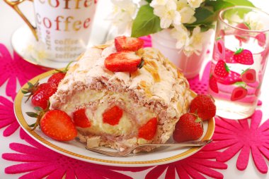 Meringue swiss roll with strawberry and almonds clipart