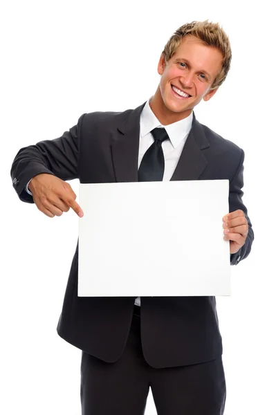Affärsman håller ren pappersark — Stockfoto