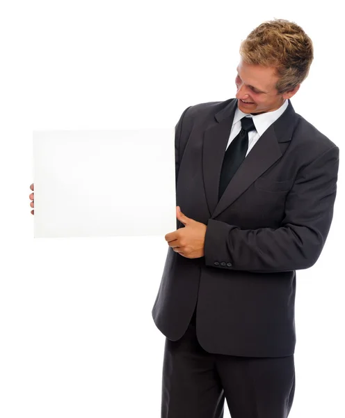 Businessman keeps clean sheet of paper — Stock Photo, Image