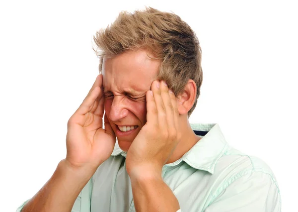 Muž s bolestí hlavy ve studiu — Stock fotografie
