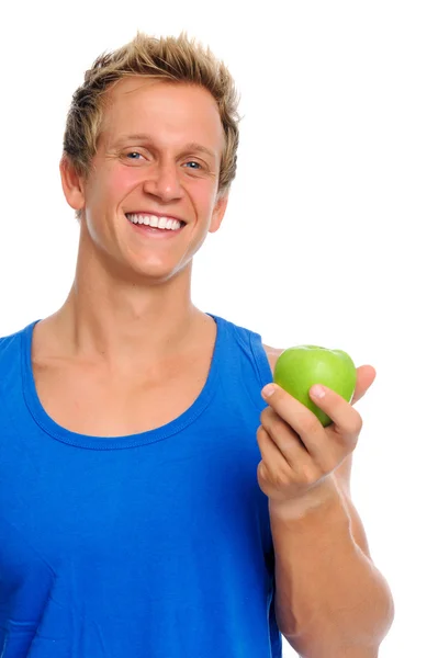 Homem desportivo com maçã — Fotografia de Stock