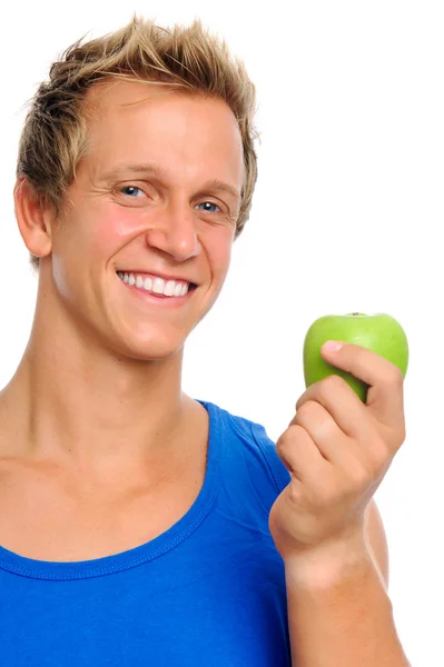 Homem desportivo com maçã — Fotografia de Stock