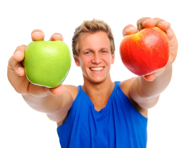 Happy sportsman with two apples — Stock Photo, Image
