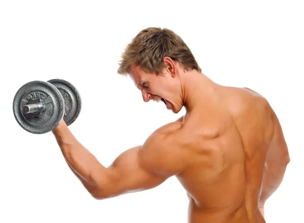 Gritando muscular homem com halteres — Fotografia de Stock