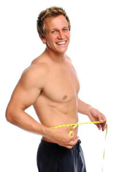 Šťastný muž s měřící páska — Stock fotografie