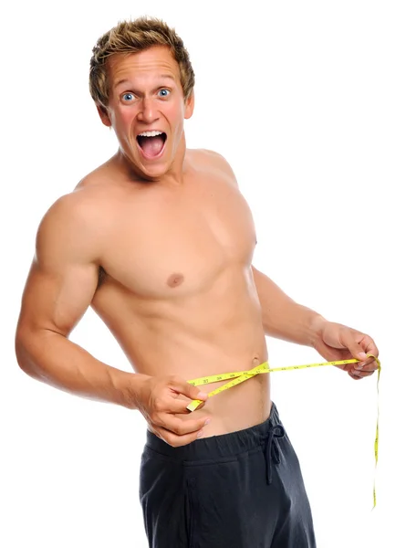Hombre excitado con cinta métrica — Foto de Stock