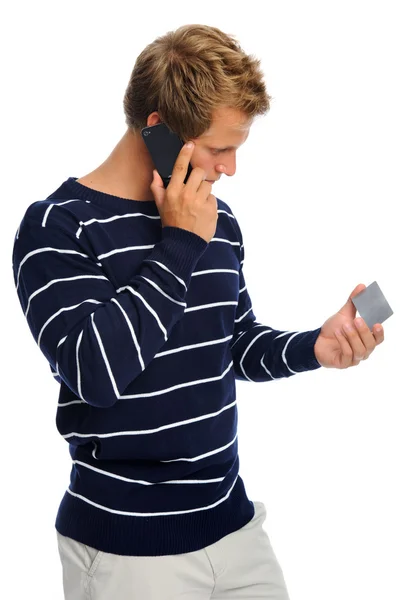 Kredi kartı ve telefon adam — Stok fotoğraf