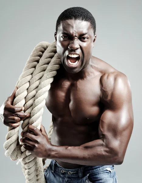 Angry muscular man — Stock Photo, Image