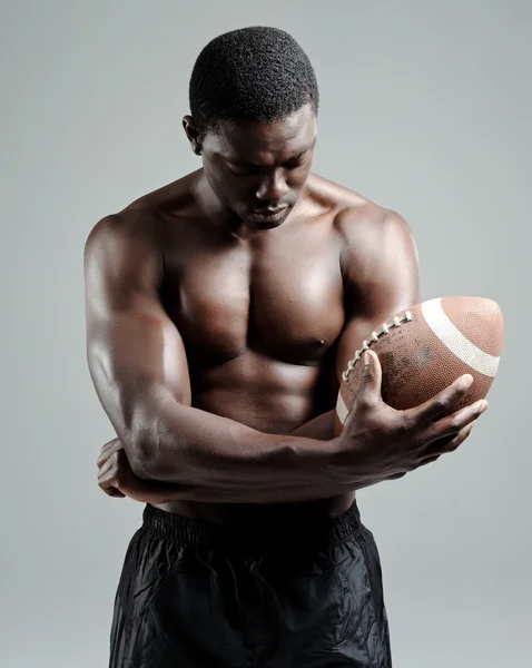 stock image Muscular american football player