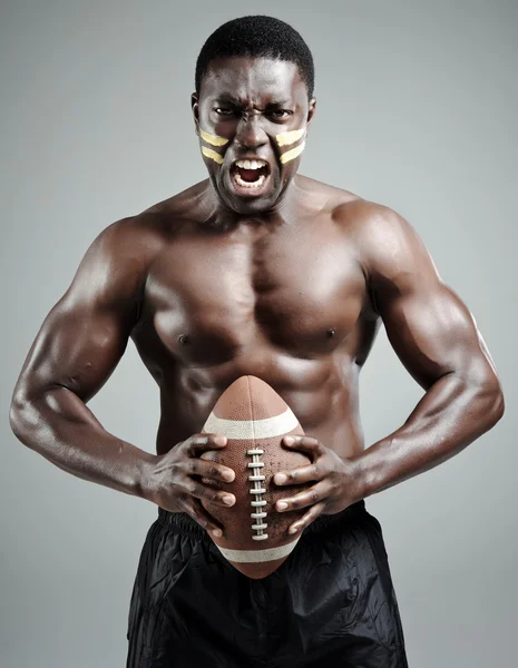 stock image Well-built american football player