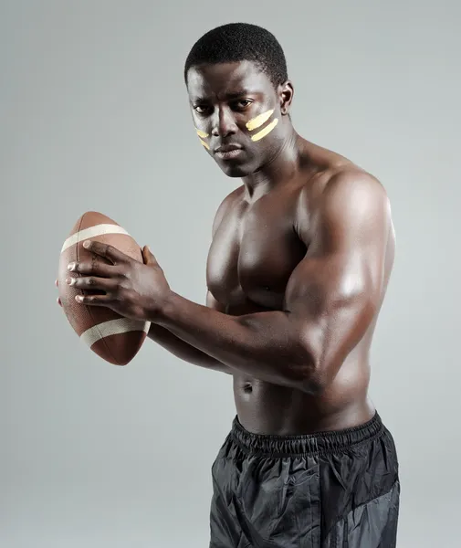 stock image Muscular american football player