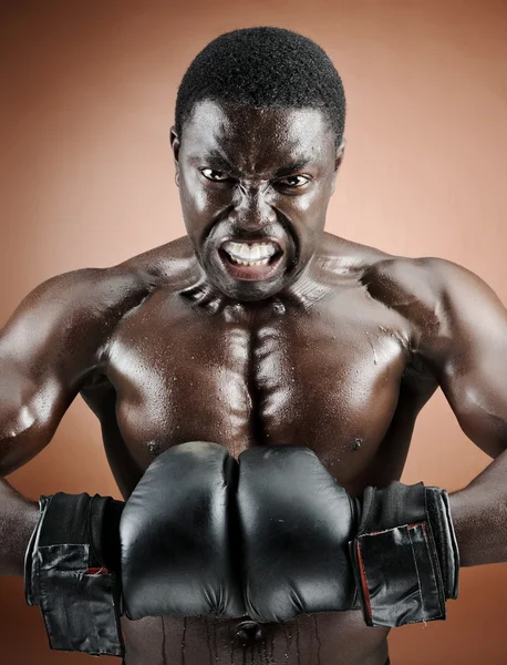 Muscular boxer with intense emotion — Stock Photo, Image