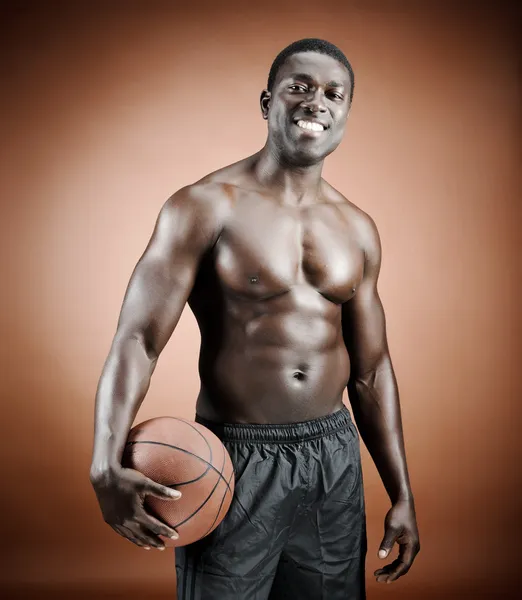 Smiling basketball player — Stock Photo, Image
