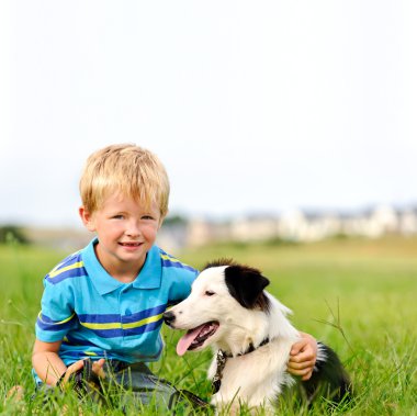 Cute boy with collie