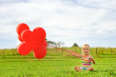 Cute girl with balloons clipart