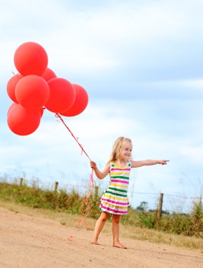 Cute blond girl on outdoor adventure clipart