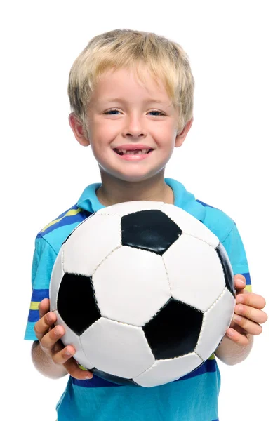 Chlapec drží fotbalový míč — Stock fotografie