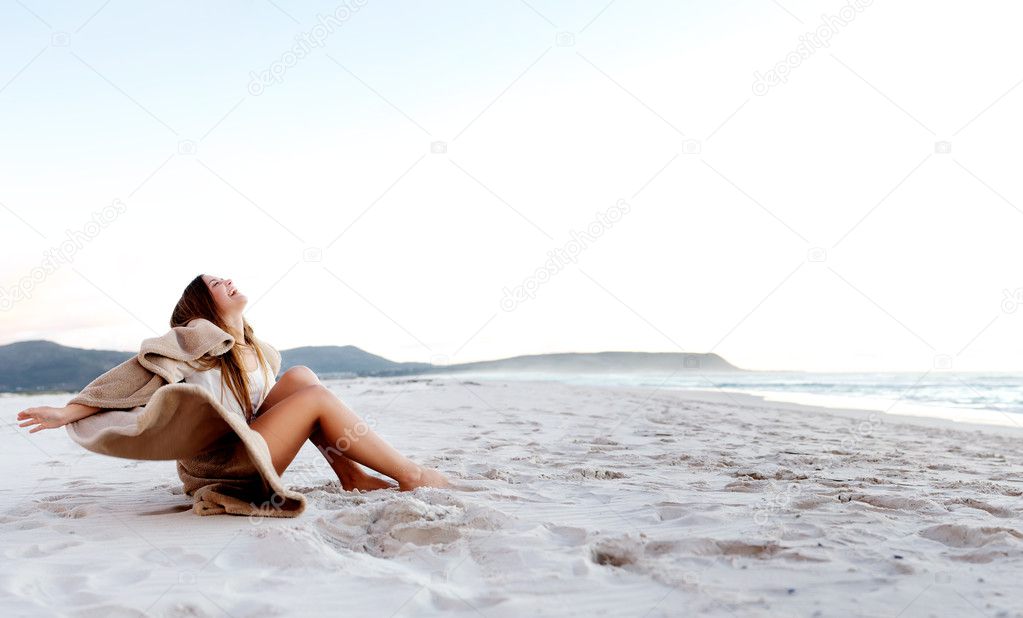Beach blanket woman