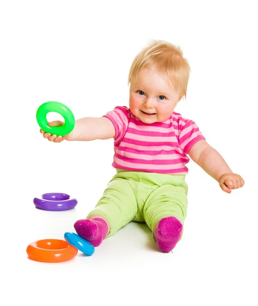 Oynayan bebek ve üzerinde beyaz izole öğrenme — Stok fotoğraf