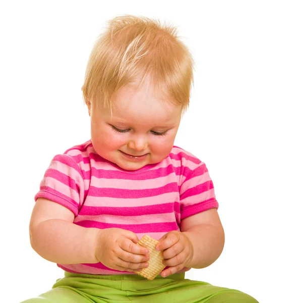 Βρέφος μωρό μαθαίνει να φάει ένα μπισκότο — Φωτογραφία Αρχείου