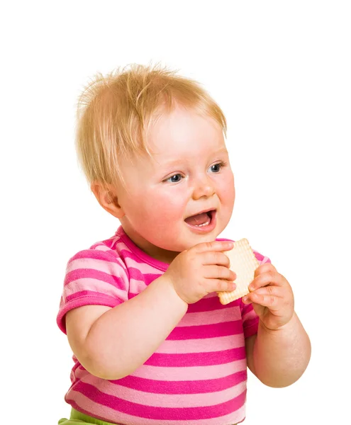 Niemowlę dziecko ucząc się jeść herbatniki — Zdjęcie stockowe