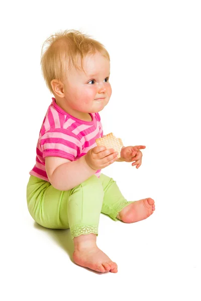 Baby baby leren om te eten een koekje — Stockfoto