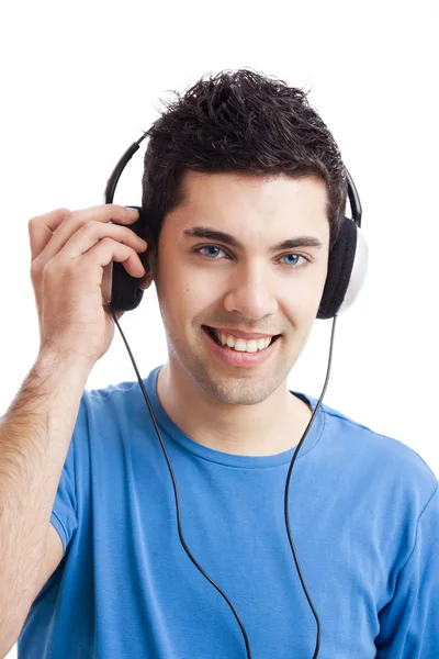 Młody człowiek słucha muzyki — Zdjęcie stockowe
